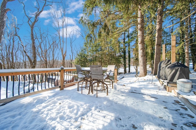 view of snow covered deck