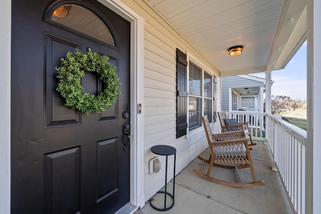 doorway to property with a porch