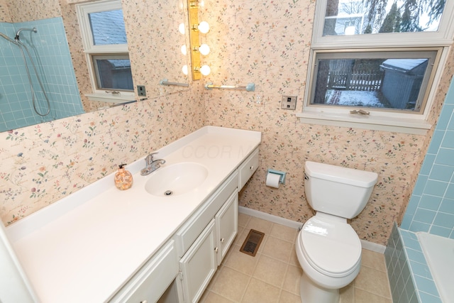 bathroom with tile patterned floors, toilet, and vanity