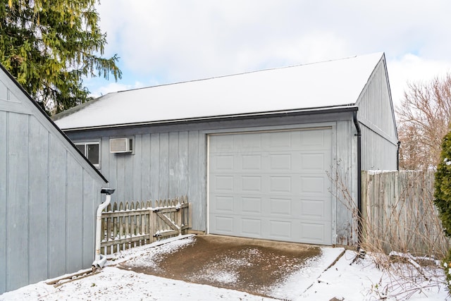 view of snow covered garage