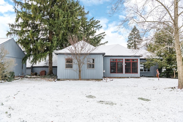 view of snow covered property