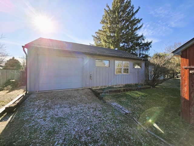 garage with a lawn