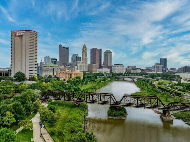 property's view of city with a water view