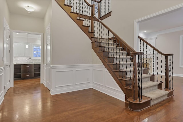 stairway with wood-type flooring