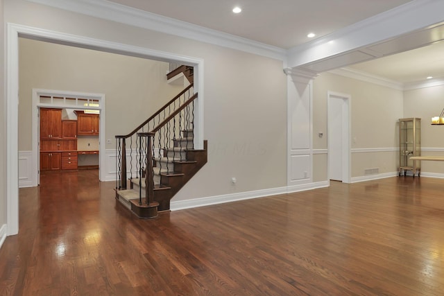 unfurnished living room with dark wood-type flooring and crown molding