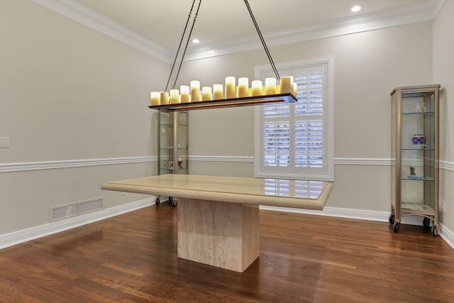 unfurnished dining area with crown molding and dark wood-type flooring