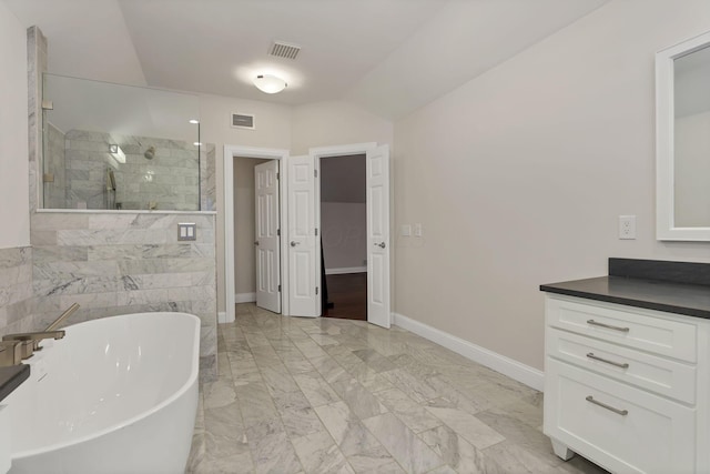 bathroom with vanity and plus walk in shower