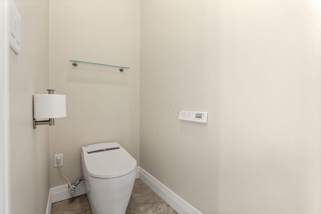 bathroom featuring toilet