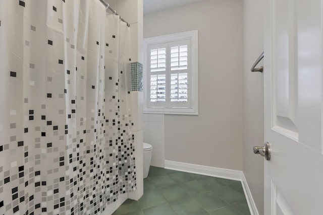 bathroom featuring curtained shower