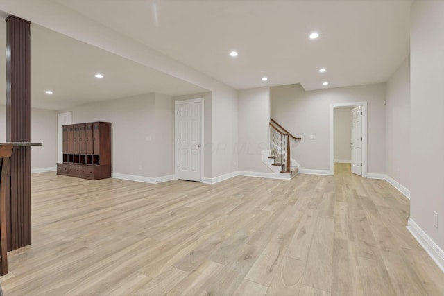 unfurnished living room with light wood-type flooring