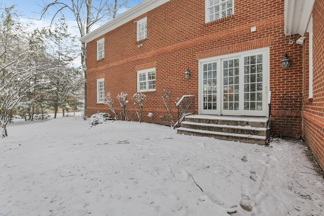 view of snow covered property