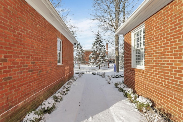 view of snow covered property