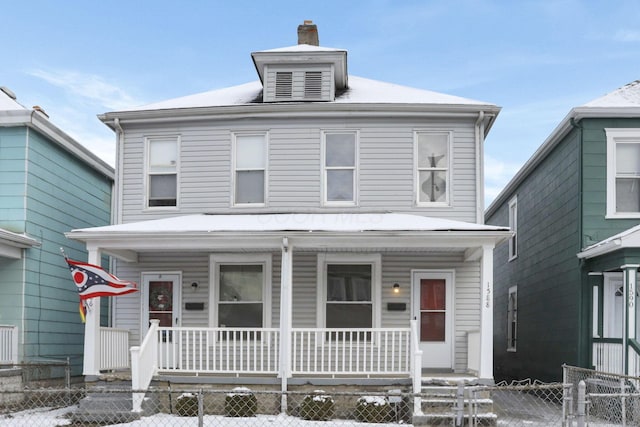 view of property featuring a porch