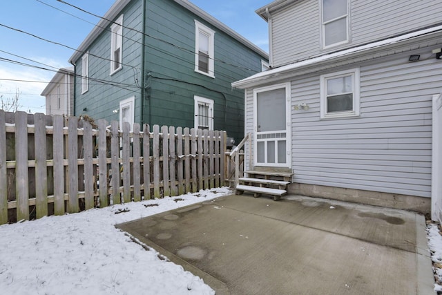 view of snow covered house