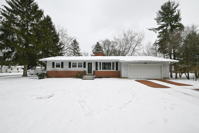 ranch-style house featuring a garage