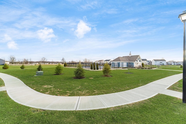 view of community featuring a yard