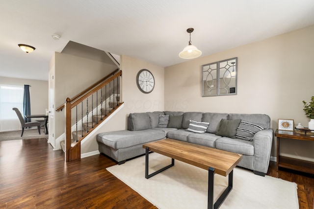 living room featuring dark wood-type flooring