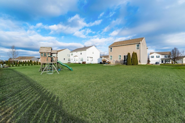 view of yard with a playground