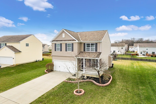 view of front of house featuring a garage and a front yard