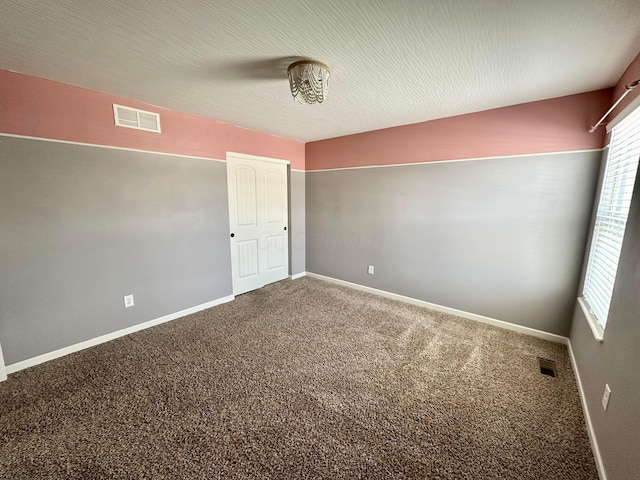 empty room with carpet floors