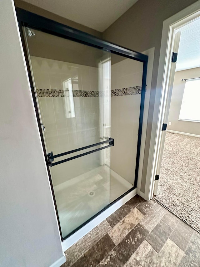 bathroom featuring walk in shower