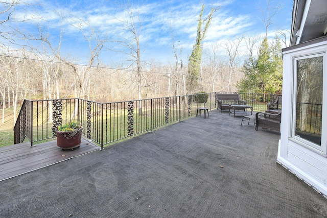 wooden deck featuring outdoor lounge area