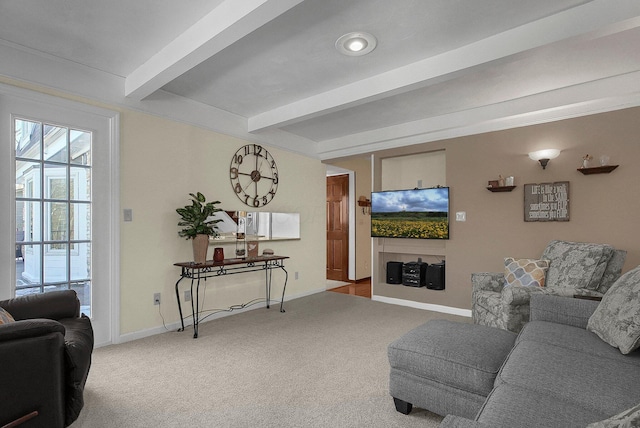 carpeted living room with beam ceiling