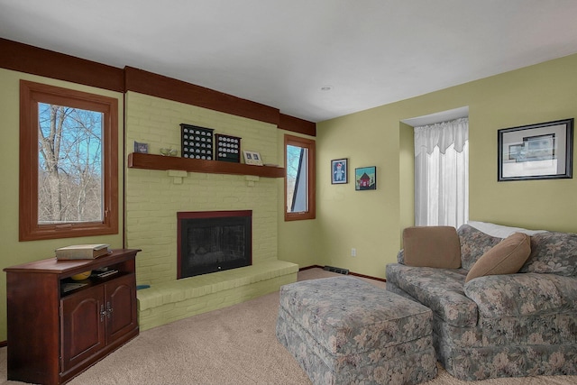 living room featuring light carpet and a brick fireplace