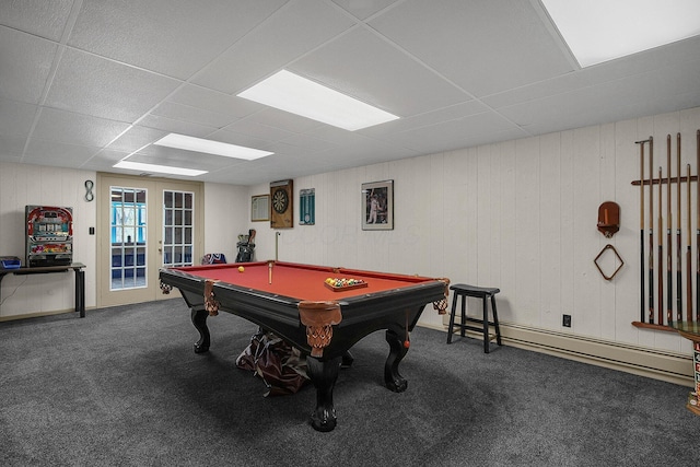 recreation room featuring dark carpet, a paneled ceiling, french doors, and baseboard heating