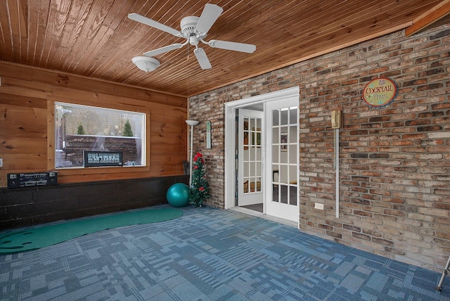 view of patio featuring french doors and ceiling fan