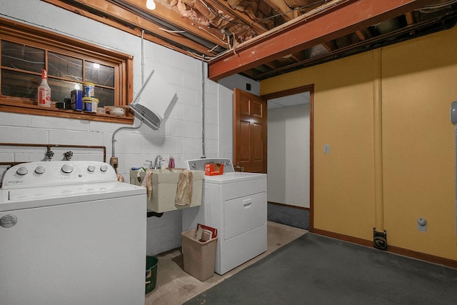 laundry area with washer and dryer and sink