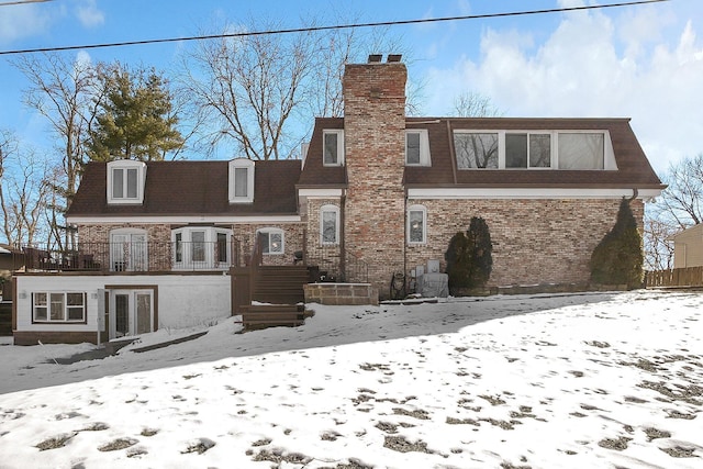 view of snow covered property