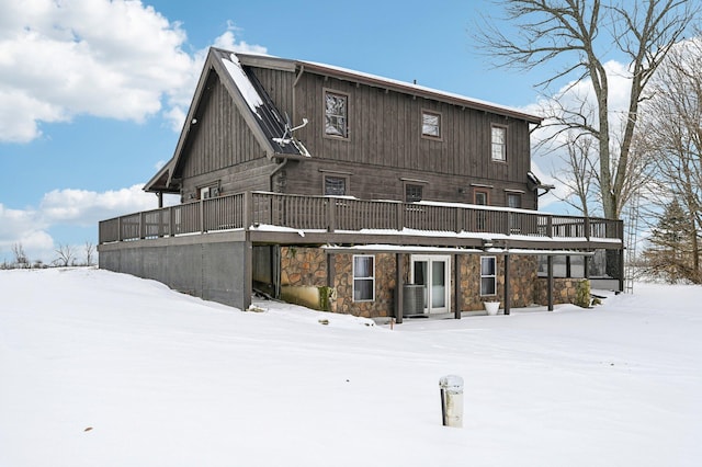 view of snow covered house