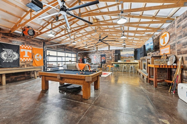 game room with a workshop area, high vaulted ceiling, and billiards