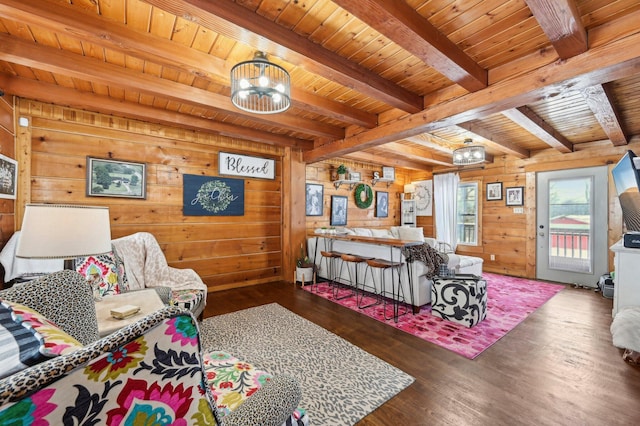 living room with beamed ceiling, hardwood / wood-style flooring, wood ceiling, and wooden walls