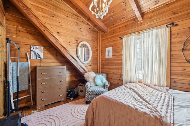 bedroom with hardwood / wood-style floors, wood walls, wooden ceiling, an inviting chandelier, and vaulted ceiling with beams