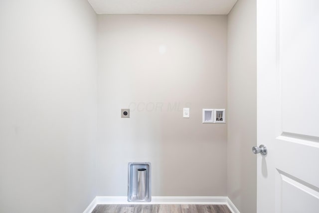 washroom featuring electric dryer hookup, wood-type flooring, and hookup for a washing machine