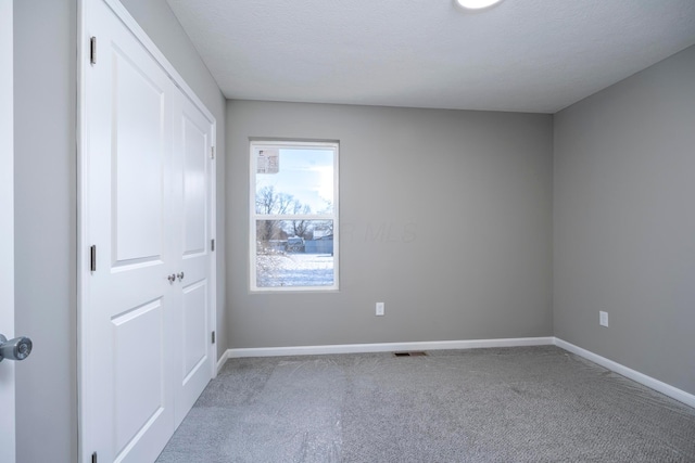 empty room with carpet floors