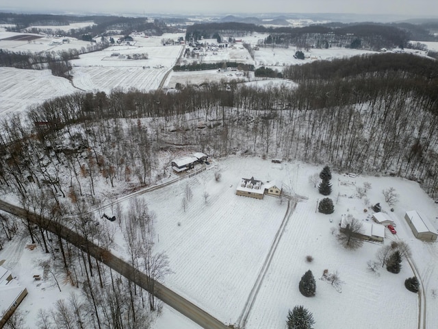 snowy aerial view with a rural view