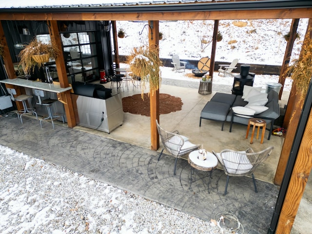 view of snow covered patio