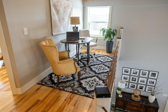 sitting room featuring hardwood / wood-style floors