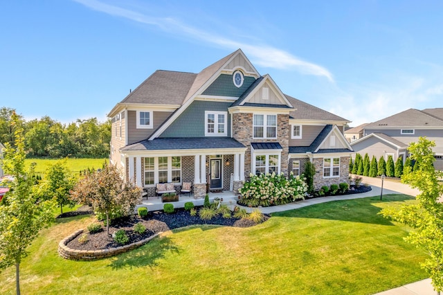 craftsman-style home with a front yard