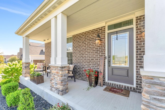 doorway to property featuring a porch