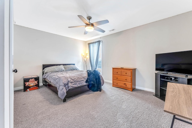 carpeted bedroom with ceiling fan