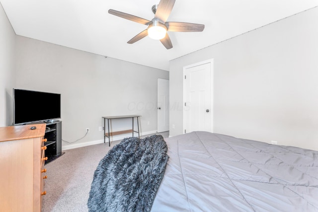 bedroom featuring ceiling fan and carpet floors