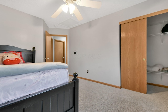 bedroom with carpet flooring, ceiling fan, and a closet