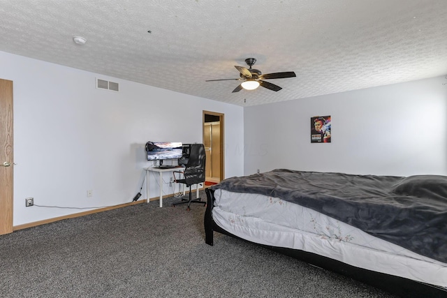 carpeted bedroom with ceiling fan and a textured ceiling