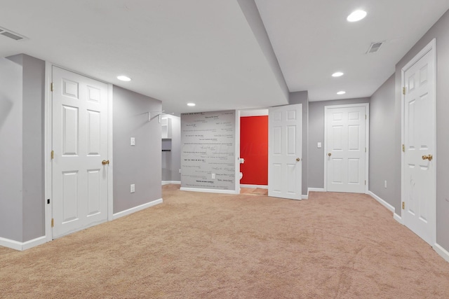 basement featuring carpet flooring