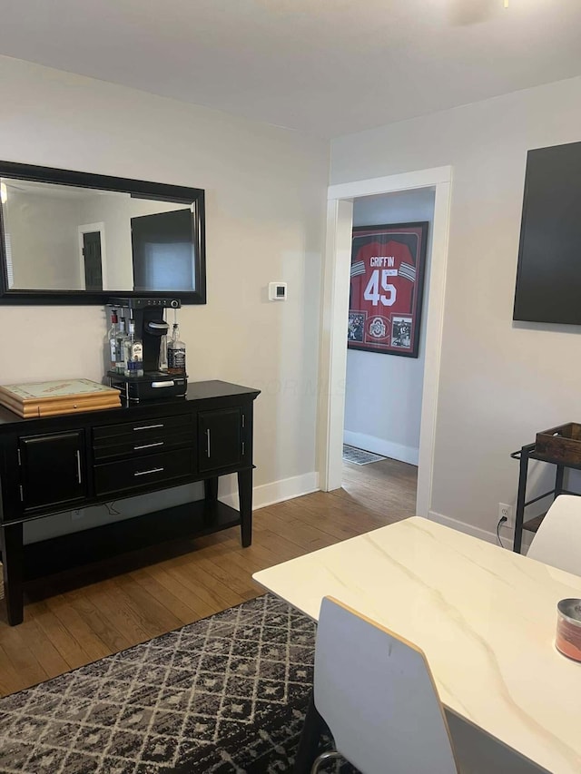 bedroom featuring dark wood-type flooring