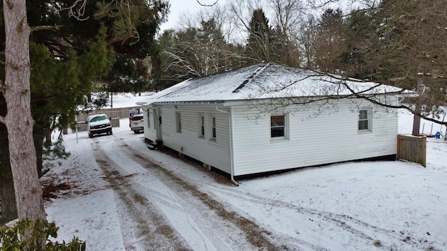 view of snow covered property